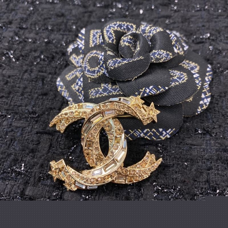 Ch*el brooches